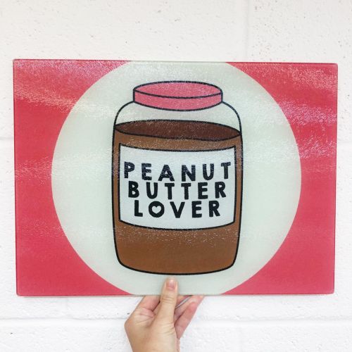 Peanut Butter Lover - glass chopping board by Stephanie Komen