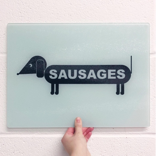 Sausage Dog - glass chopping board by Adam Regester