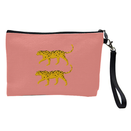 Leopard Pair ( coral background ) - pretty makeup bag by Adam Regester