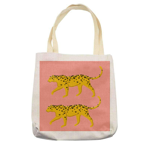 Leopard Pair ( coral background ) - printed tote bag by Adam Regester