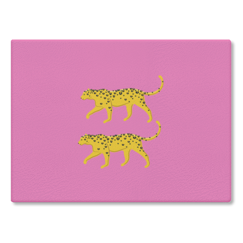 Leopard Pair ( pink background ) - glass chopping board by Adam Regester