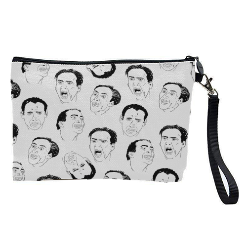 Cage gives good face - pretty makeup bag by kirstin stride
