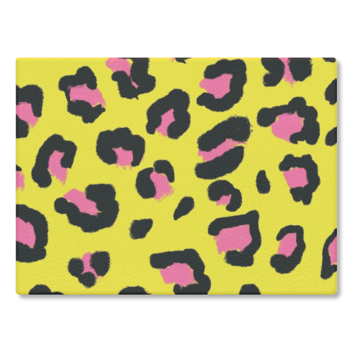 Leopard print yellow and pink - glass chopping board by Cheryl Boland