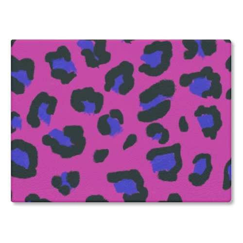 Leopard print magenta and navy - glass chopping board by Cheryl Boland