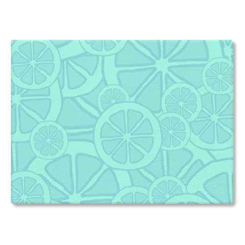 Blue fruit slices - glass chopping board by Cheryl Boland