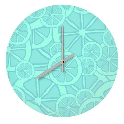 Blue fruit slices - quirky wall clock by Cheryl Boland