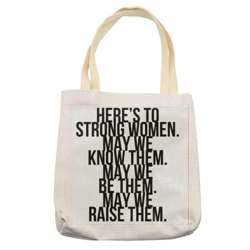 Here's to Strong Women. May We Know Them. May We Be Them. May We Raise Them. Bold - printed tote bag by Toni Scott