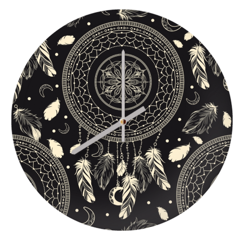dreamcatcher - quirky wall clock by haris kavalla