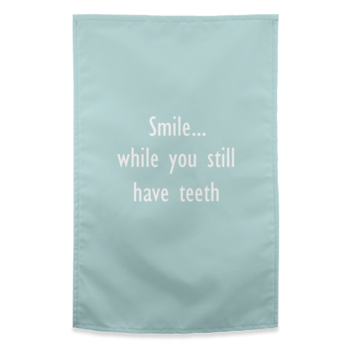 Smile while you still have teeth - funny tea towel by Giddy Kipper