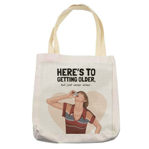 Here's To Getting Older But Never Wiser Funny Birthday Quote Print - printed canvas tote bag by Sundiva Designs