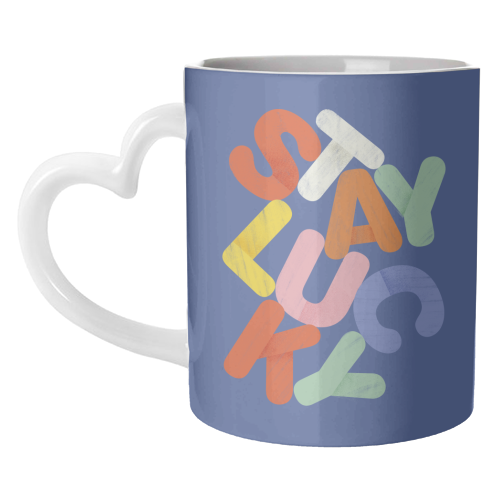 Stay Lucky: A Colorful Reminder of Positivity - unique mug by Ania Wieclaw