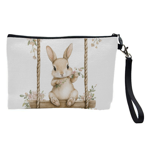 Bunny in a wooden swing - pretty makeup bag by haris kavalla