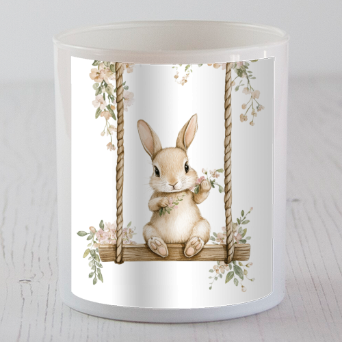Bunny in a wooden swing - scented candle by haris kavalla