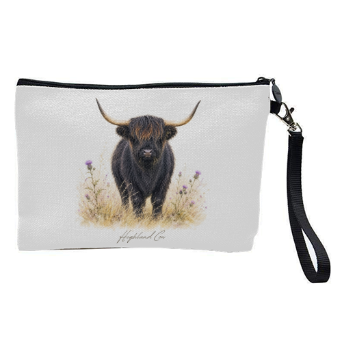 Black Highland Cow with thistles. - pretty makeup bag by Wildling Studio