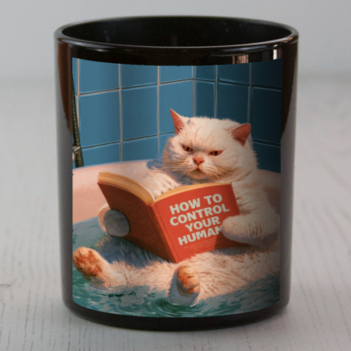A white cat reading book "How to control your human - scented candle by DejaReve