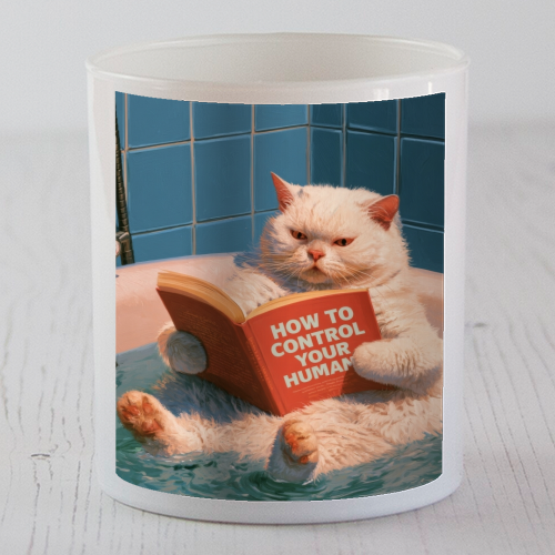 A white cat reading book "How to control your human - scented candle by DejaReve