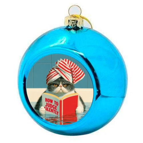 A cat reading book about Judging - colourful christmas bauble by DejaReve