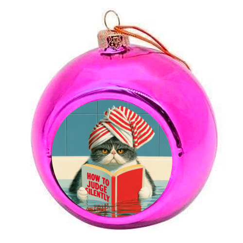 A cat reading book about Judging - colourful christmas bauble by DejaReve