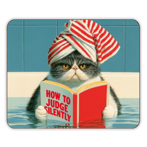 A cat reading book about Judging - designer placemat by DejaReve